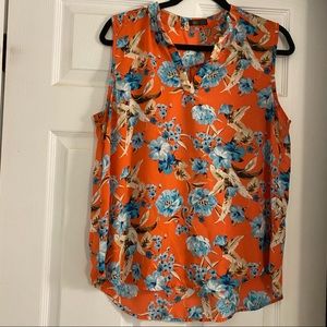 CURE sleeveless floral blouse